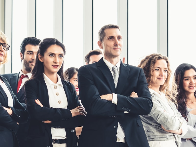 Asian business professionals in a corporate team setting